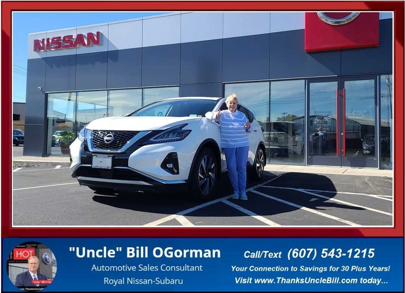 Millie and her BRAND NEW Nissan Murano!  Congratulations from "Uncle" Bill and the Royal Auto Group!